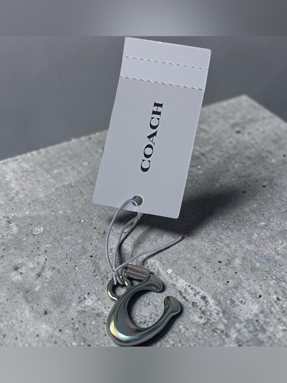 C Coach charm nwt silver